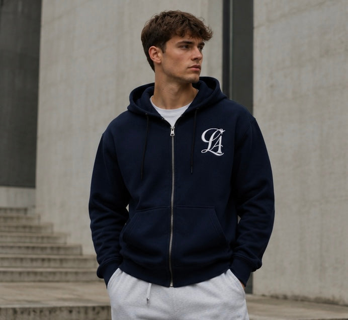 Man wearing the first CLASIFY navy zip hoodie