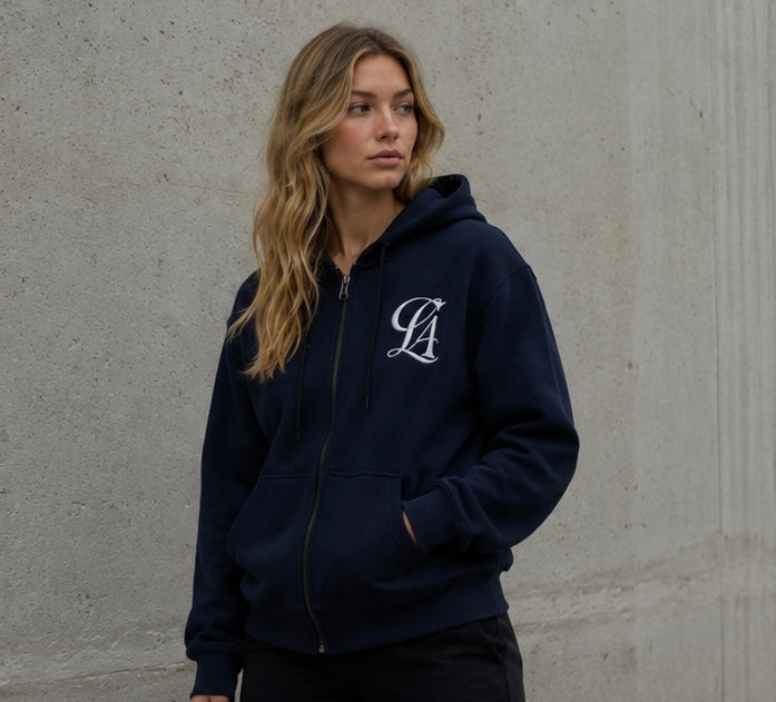 Woman wearing the first CLASIFY navy zip hoodie